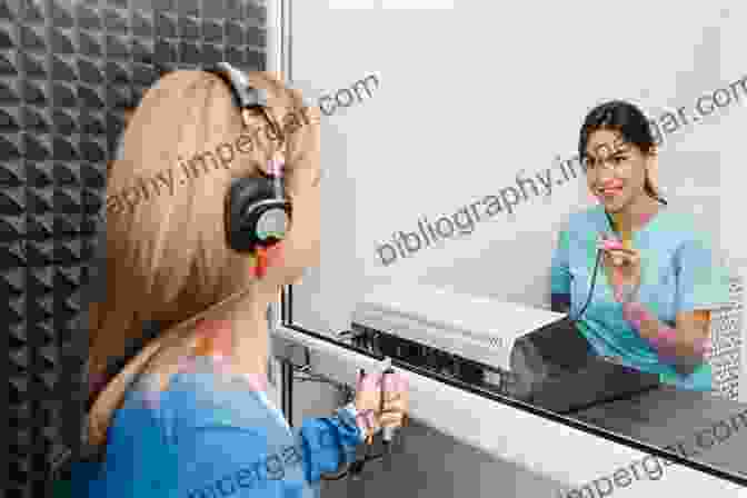 An Audiologist Performing An Ear Examination On A Patient. To Audiology (2 Downloads) (Pearson Communication Sciences And DisFree Downloads)