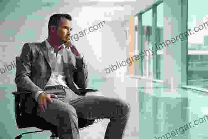 Businessman Sitting On A Chair With A Determined Expression Looking Towards A Bright Light The Ultimate Guide To Success And Profit