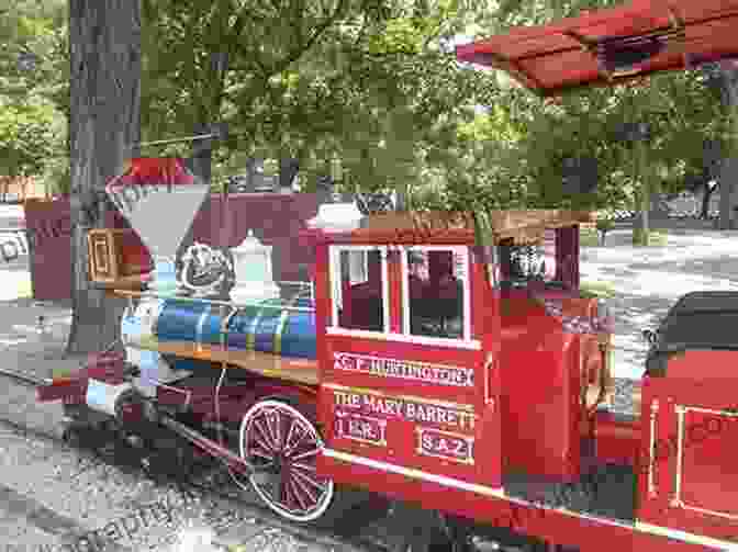 Rowboats Gracefully Glide Across The Shimmering Waters Of The San Antonio River In Brackenridge Park. Brackenridge Park: San Antonio S Acclaimed Urban Park